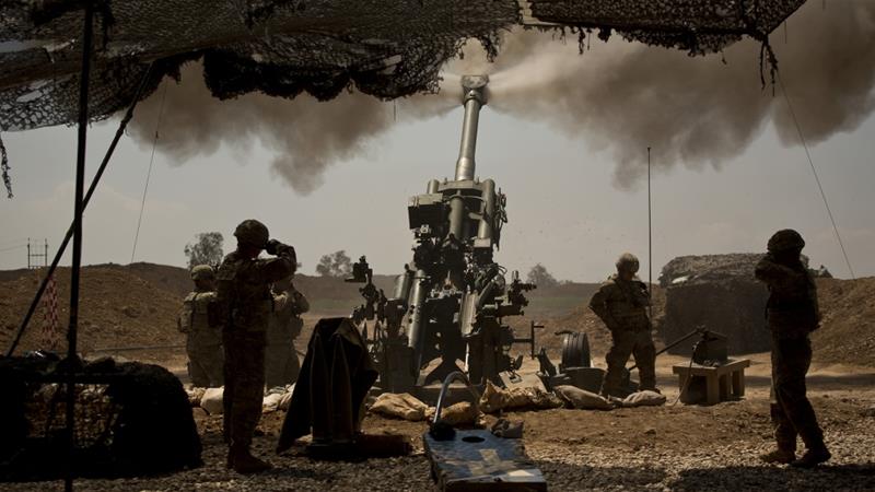 US targets pro-Iran militia bases in Iraq, Syria raids